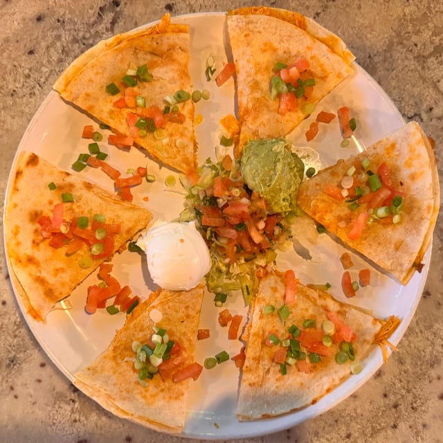 La Quesadilla Con Carne.