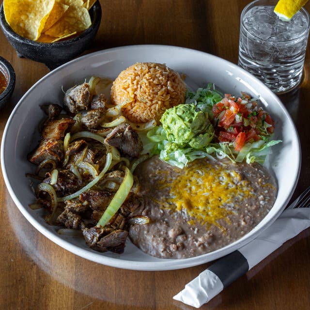Carnitas De Puerco.